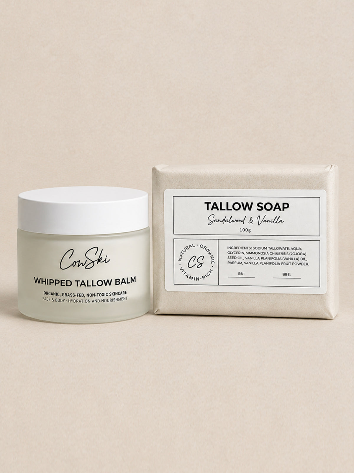 A jar of CowSki Whipped Tallow Balm next to a wrapped bar of Tallow Soap in Sandalwood & Vanilla, set against a neutral beige background.
