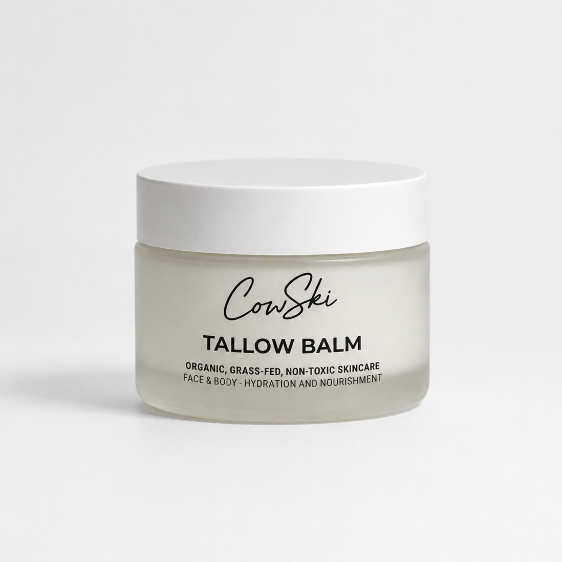 Tallow balm jar with 'CowSki' branding on a white background